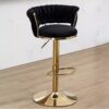 Luxury Velvet Swivel Bar Stool with gold base and curved backrest.